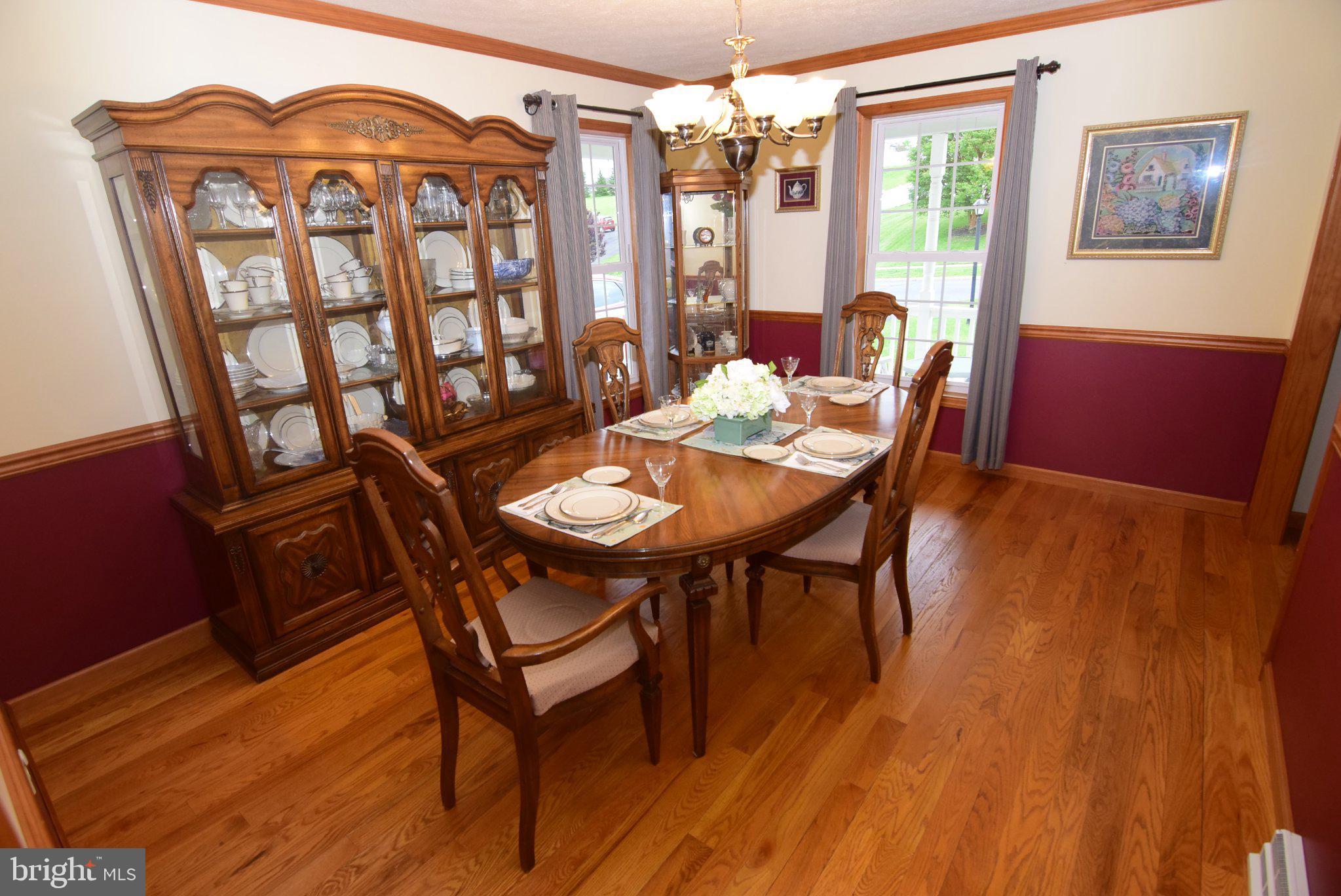 470 Millgate Road Bellefonte, PA 16823 - Photo 25 of 63 a view of a dining room with furniture window and wooden floor