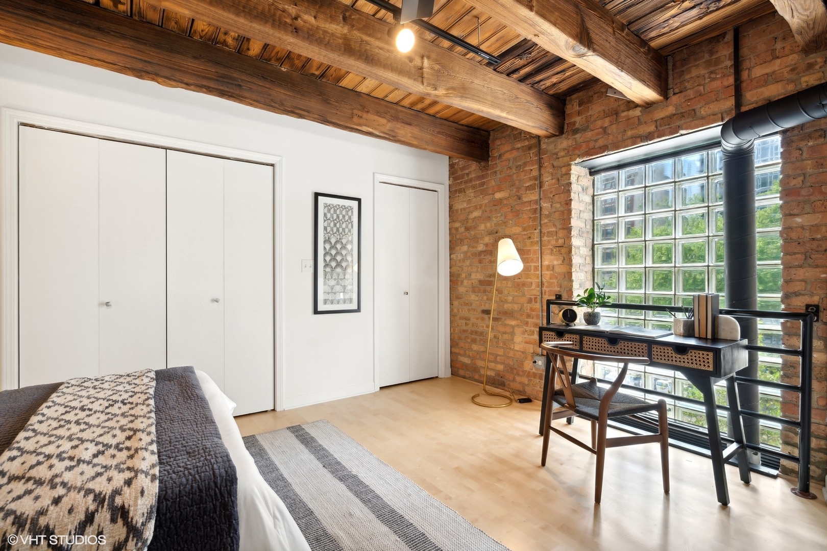 11 North Green Street, Unit 2D Chicago, IL 60607 - Photo 21 of 26 a bedroom with furniture and a window