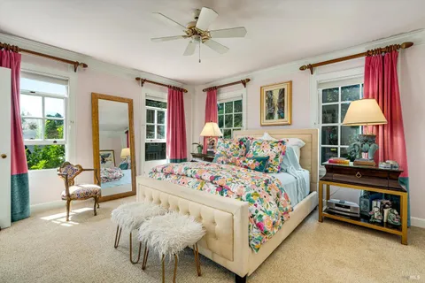 a spacious bathroom with a granite countertop sink mirror and a