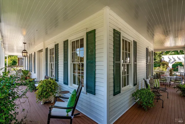 a backyard of a house with seating space