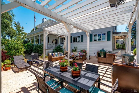 a view of a building with sitting area