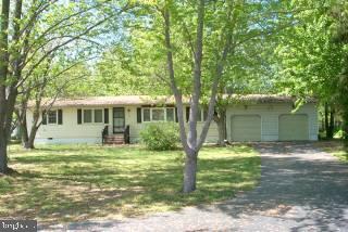 23680 Deal Island Road Chance, MD 21821 - Photo 1 of 5 a view of a house with a yard