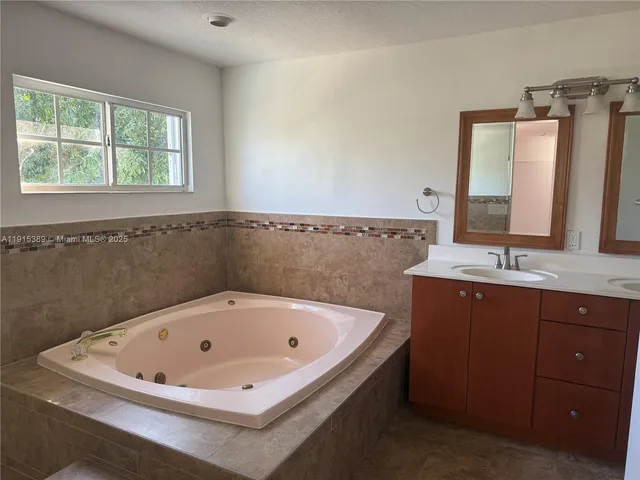 a white toilet sitting in a bathroom