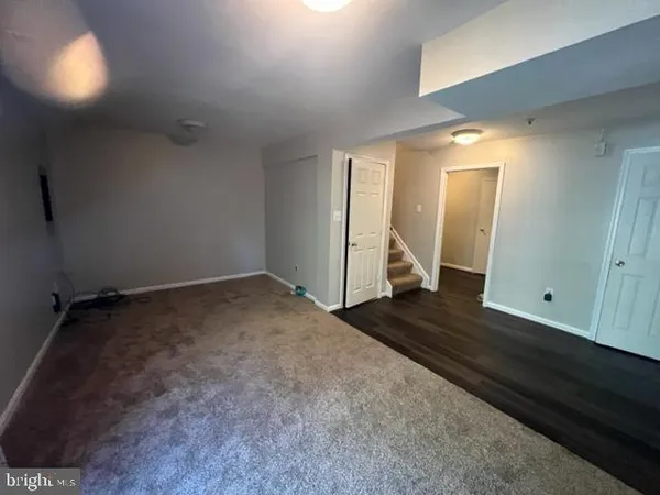 a view of a room that has a large window