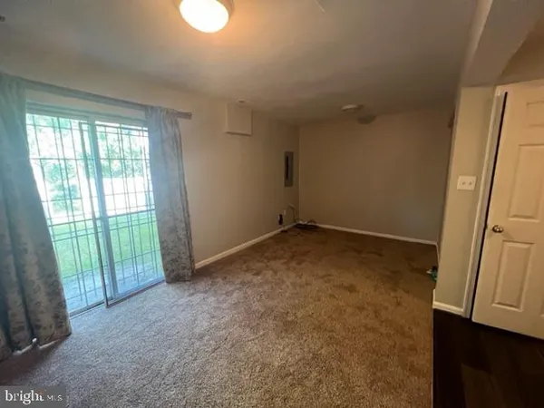 a bathroom with a shower and toilet
