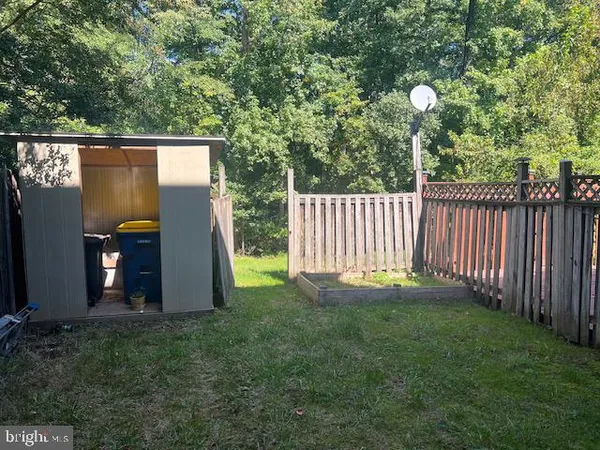 a view of balcony with wooden floor