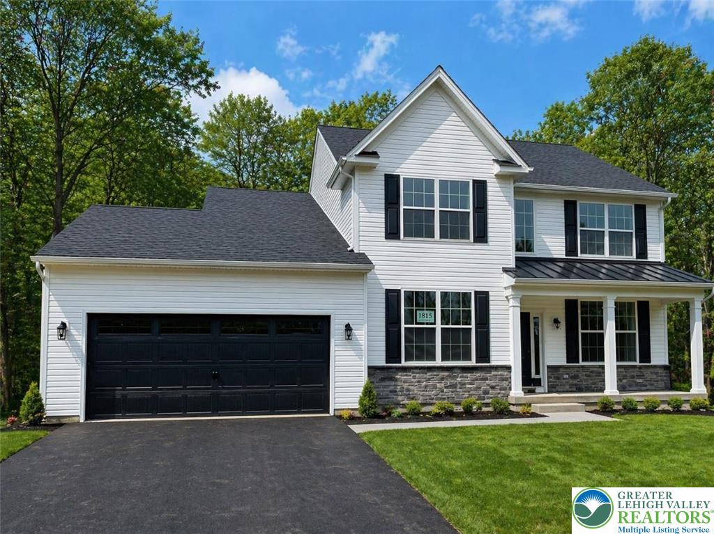 777 Adams Road Breinigsville, PA 18031 - Photo 1 of 24 a front view of a house with a yard
