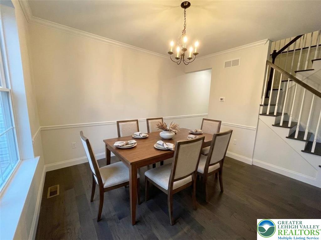 777 Adams Road Breinigsville, PA 18031 - Photo 4 of 24 a view of a dining room with furniture and wooden floor