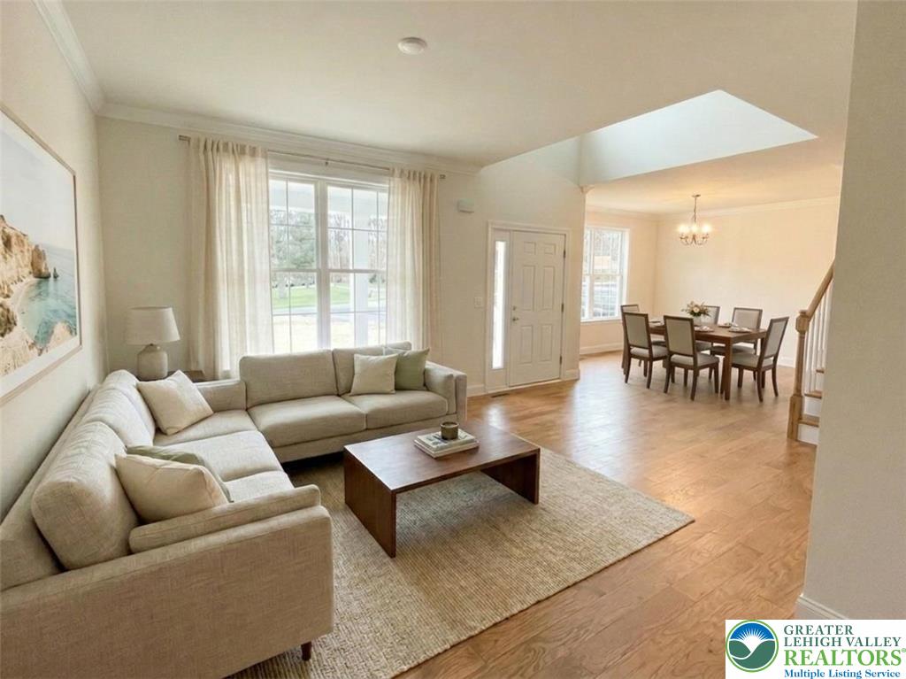 777 Adams Road Breinigsville, PA 18031 - Photo 5 of 24 a living room with furniture and a large window