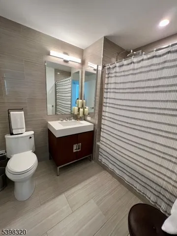 a utility room with sink dryer and washer