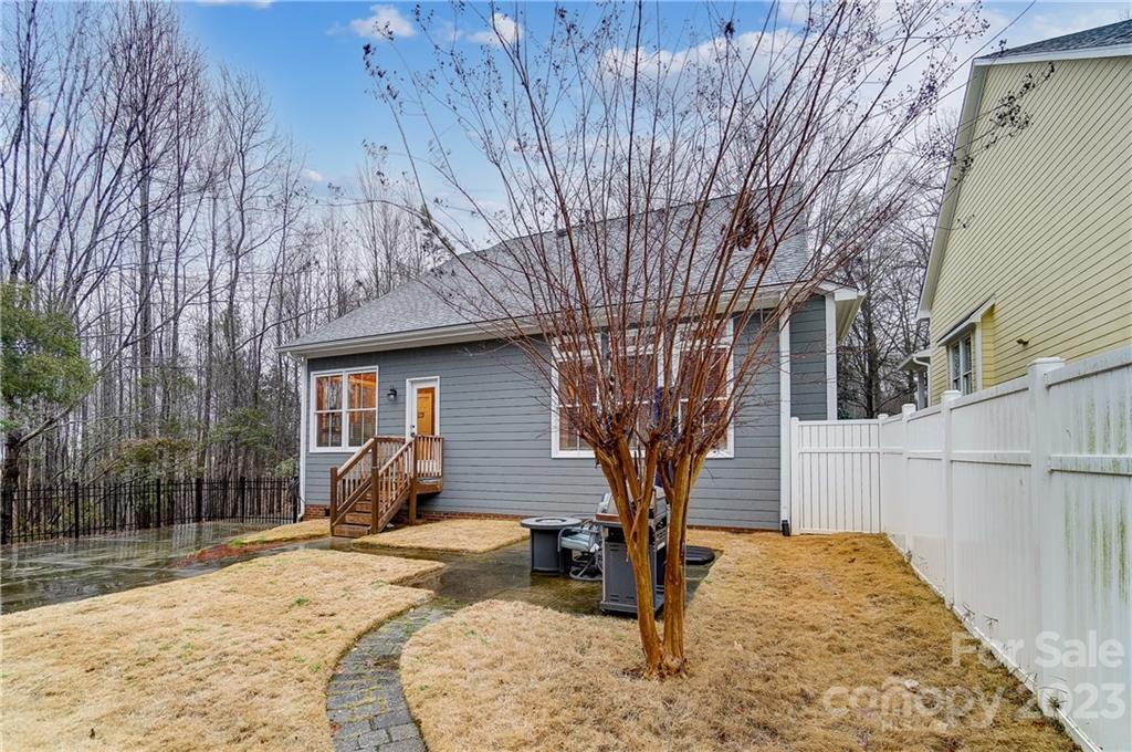 2557 Lower Assembly Drive Fort Mill, SC 29708 - Photo 29 of 32 a front view of a house with garden