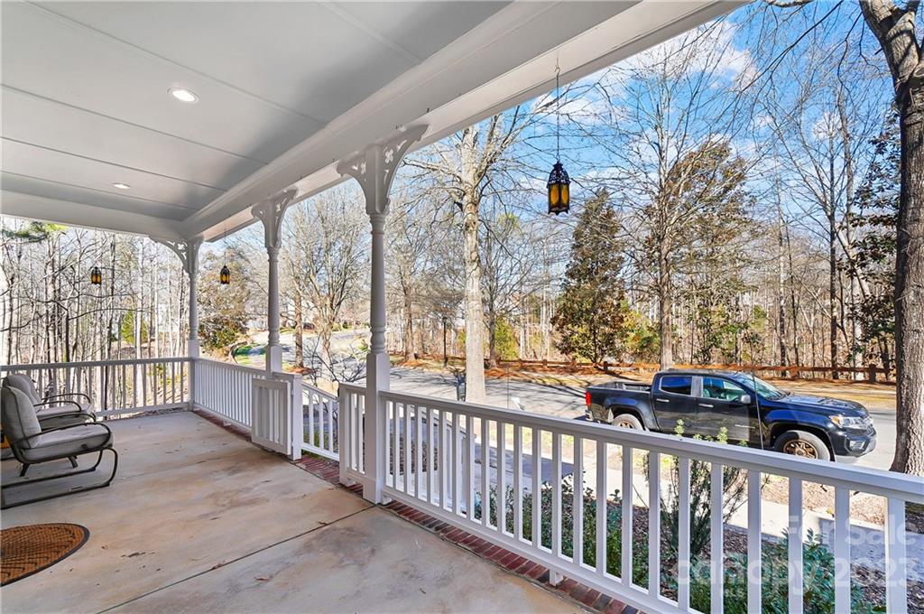 2557 Lower Assembly Drive Fort Mill, SC 29708 - Photo 3 of 32 a view of a porch with wooden floor of stairs
