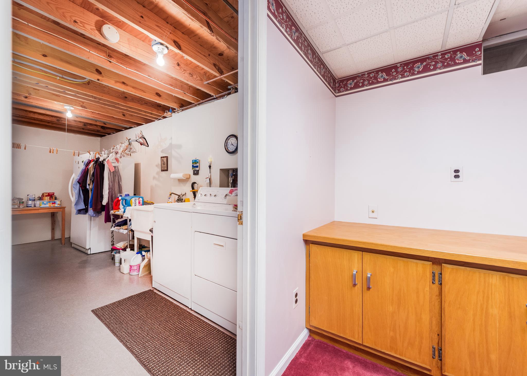9502 Red Rain Path Columbia, MD 21046 - Photo 24 of 29 Laundry storage area