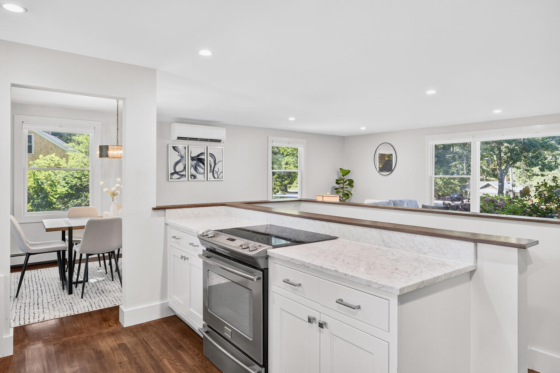 95 South Orleans Road Orleans, MA 02653 - Photo 14 of 38 a kitchen with stainless steel appliances granite countertop a stove a sink and a refrigerator