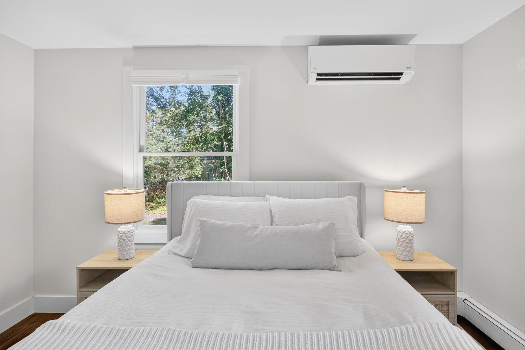 95 South Orleans Road Orleans, MA 02653 - Photo 27 of 38 a bedroom with a bed and a lamp