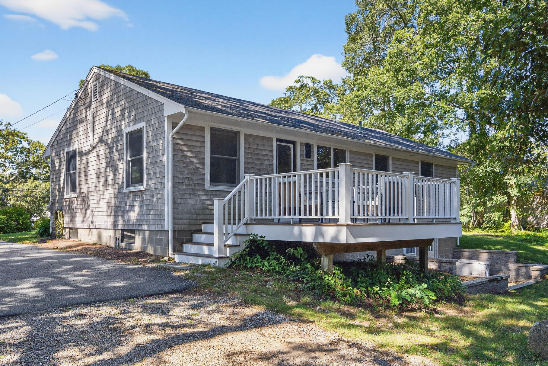 95 South Orleans Road Orleans, MA 02653 - Photo 30 of 38 a view of a house with a yard and plants
