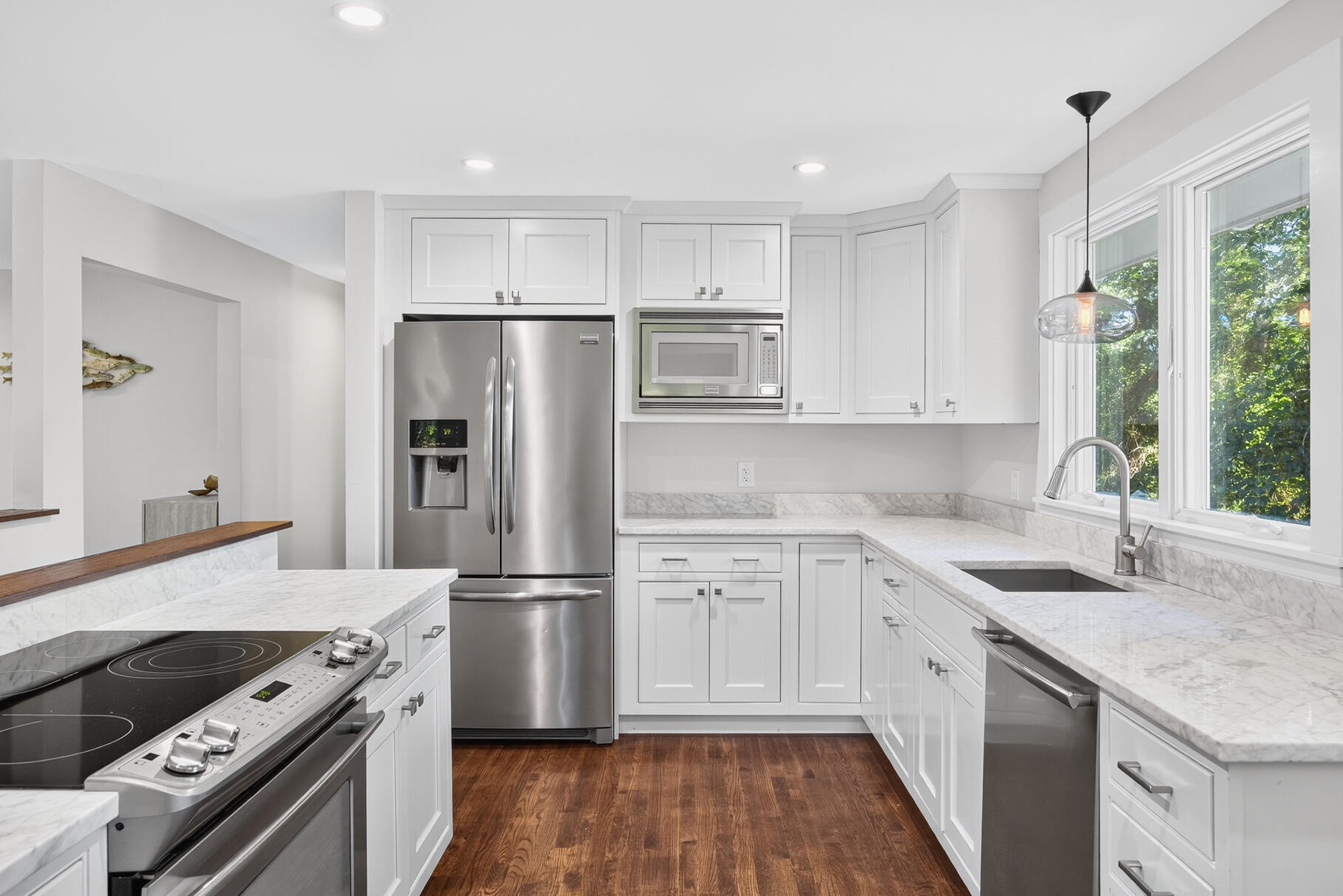 95 South Orleans Road Orleans, MA 02653 - Photo 4 of 38 a kitchen with a sink stove and refrigerator
