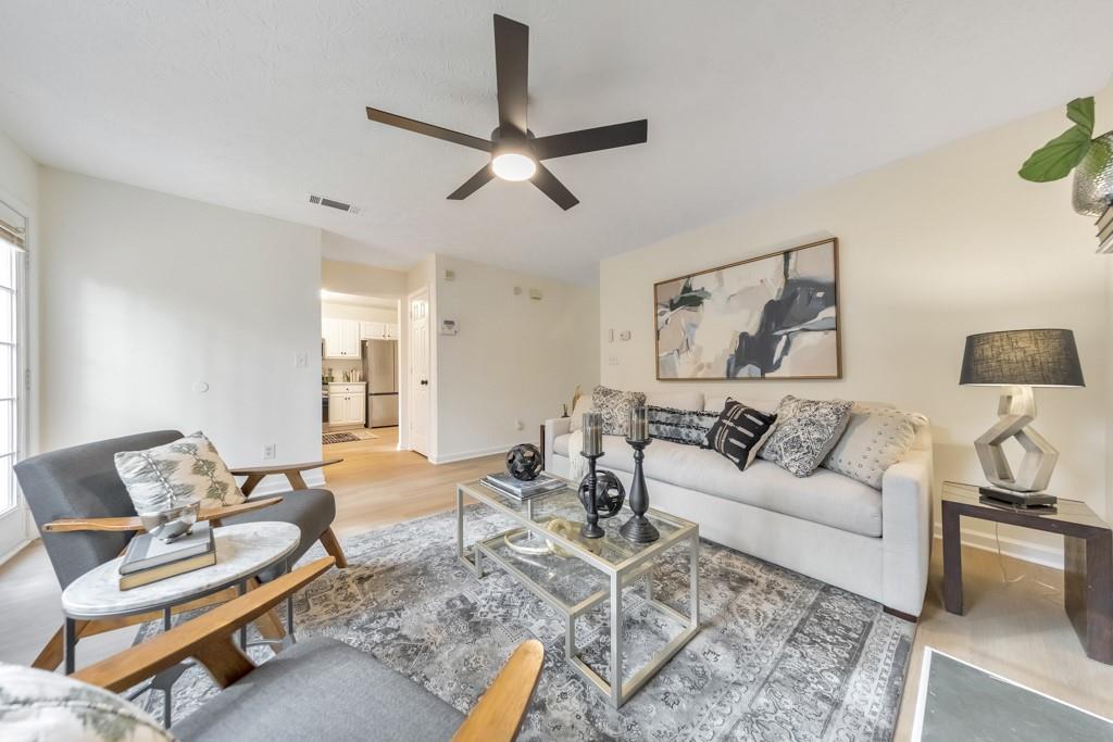 334 Fallview Drive McDonough, GA 30253 - Photo 15 of 34 a living room with furniture and a rug