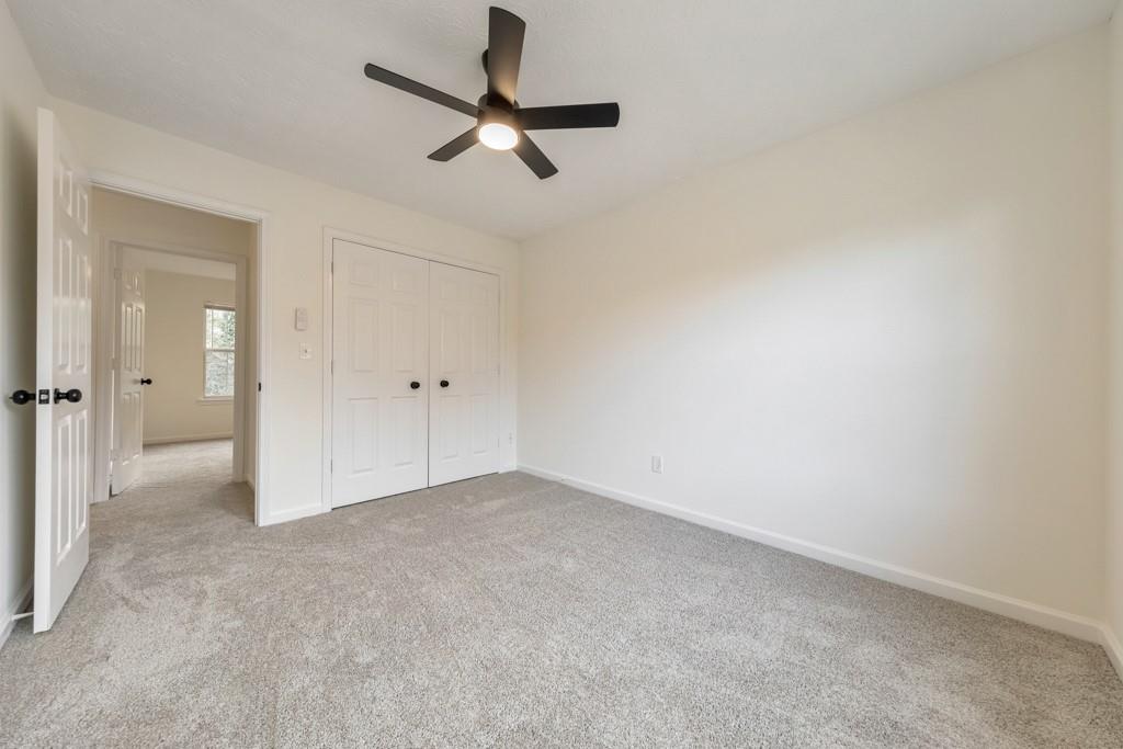334 Fallview Drive McDonough, GA 30253 - Photo 23 of 34 an empty room with fan