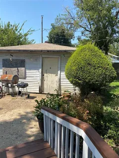 a view of a garden with a fountain