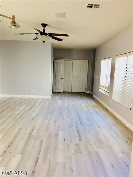8897 Houston Ridge Avenue Las Vegas, NV 89178 - Photo 4 of 12 Clean, luminous flooring provides a seamless flow through this open-concept interior.