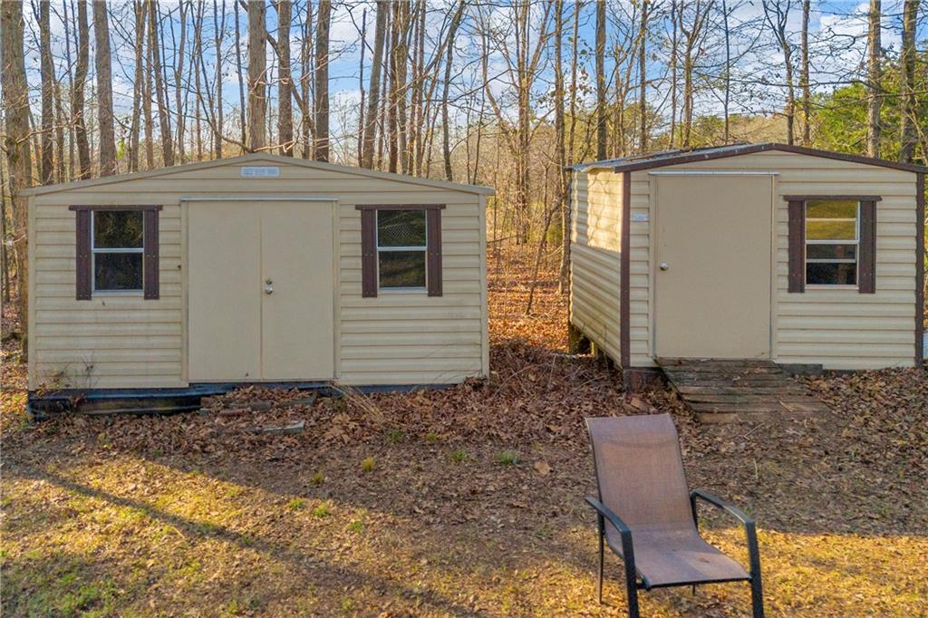 1019 White Hill School Road Commerce, GA 30529 - Photo 21 of 53 a view of a house with backyard and sitting area
