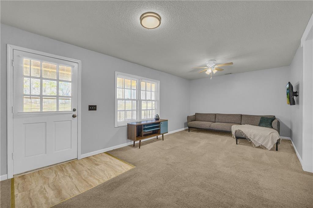1019 White Hill School Road Commerce, GA 30529 - Photo 23 of 53 a living room with furniture and a window