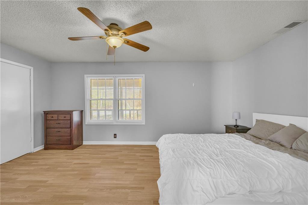 1019 White Hill School Road Commerce, GA 30529 - Photo 43 of 53 a bedroom with a bed and window
