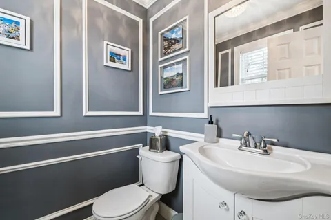 a bathroom with a sink and a toilet