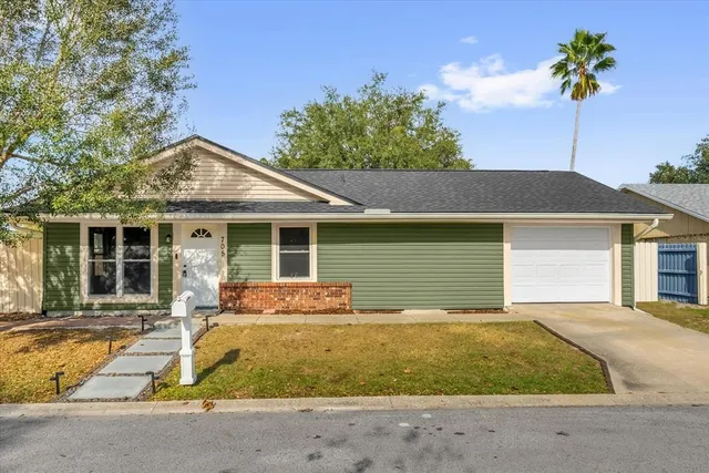 a front view of a house with a porch