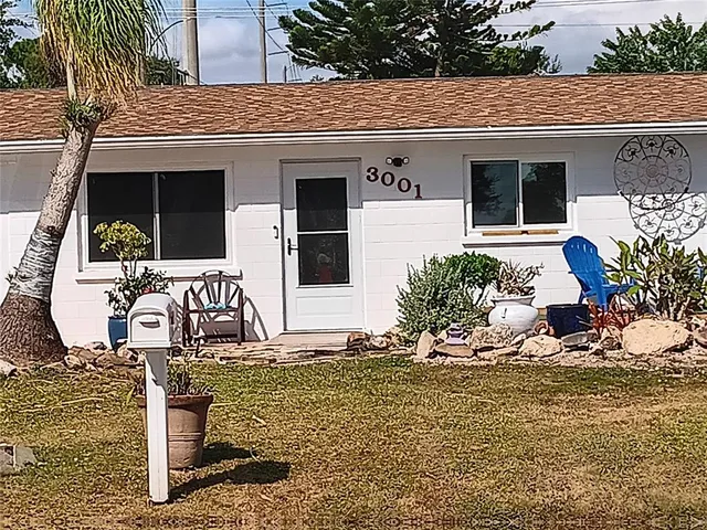 a front view of a house with patio