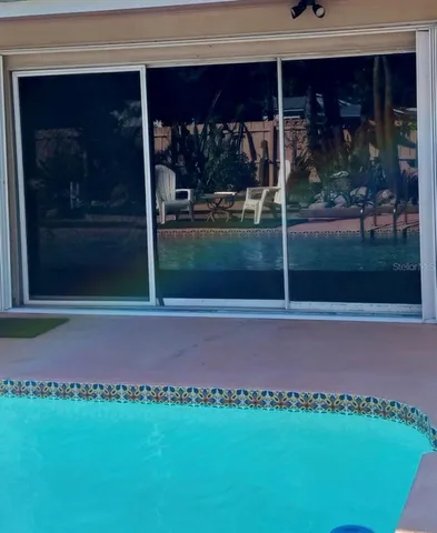 a view of yard with seating area and green space