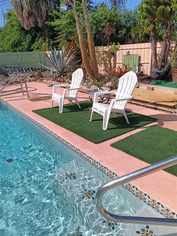 a yard with table and chairs