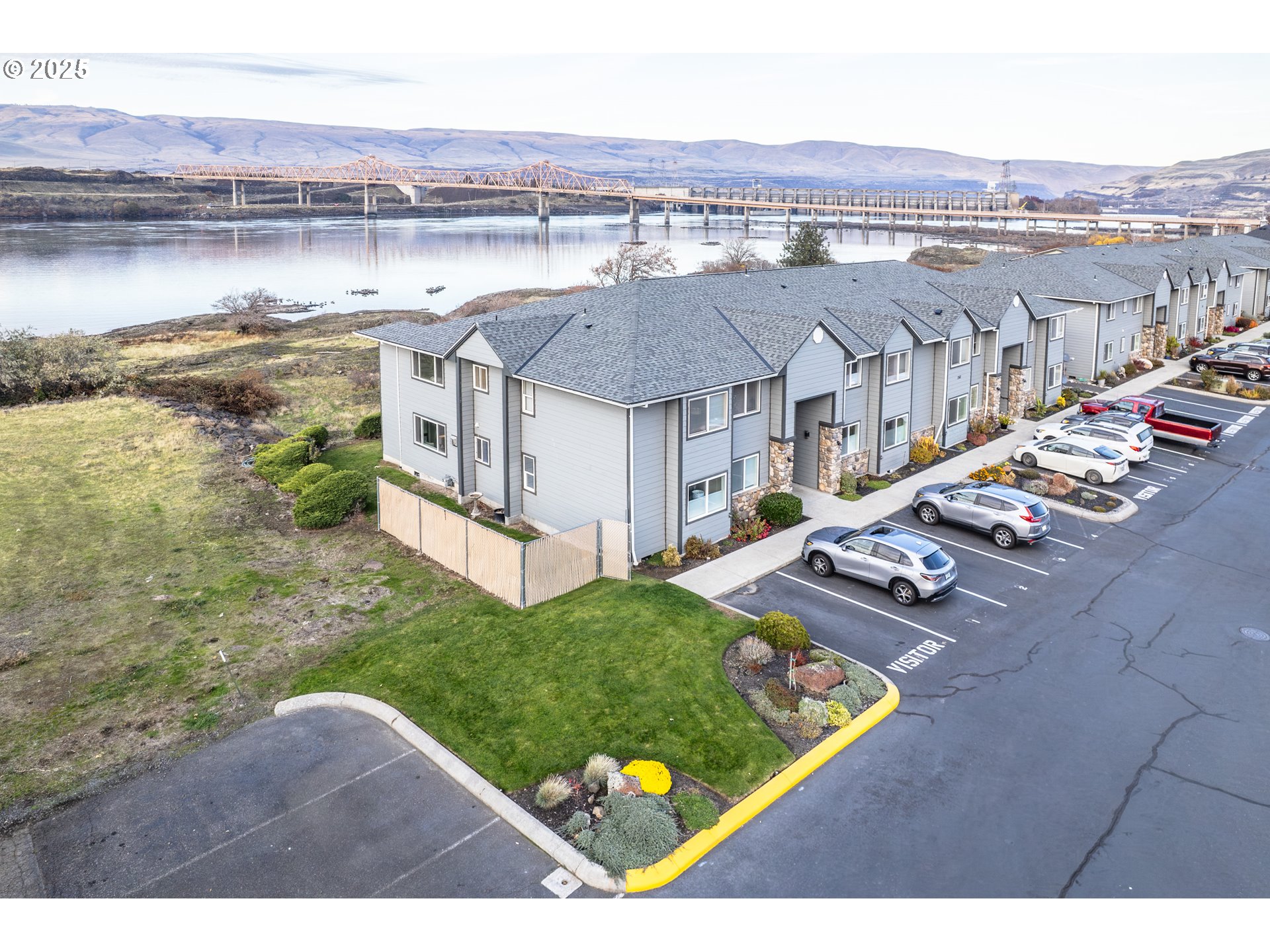 240 Lone Pine Lane, Unit 2 The Dalles, OR 97058 - Photo 2 of 37 a view of a lake with a city