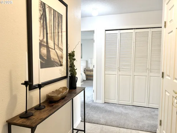 a view of a room with a large window