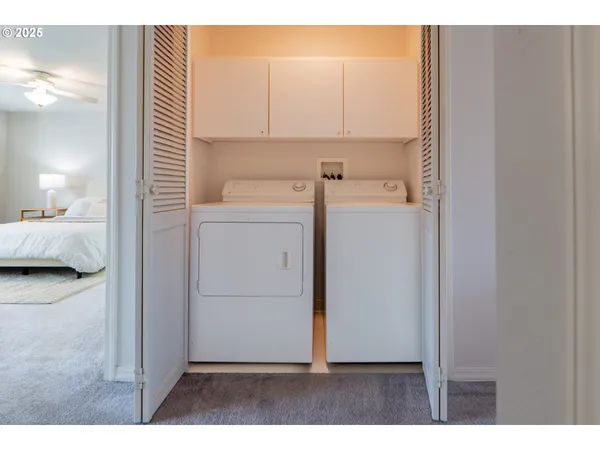 a view of bathroom and utility room