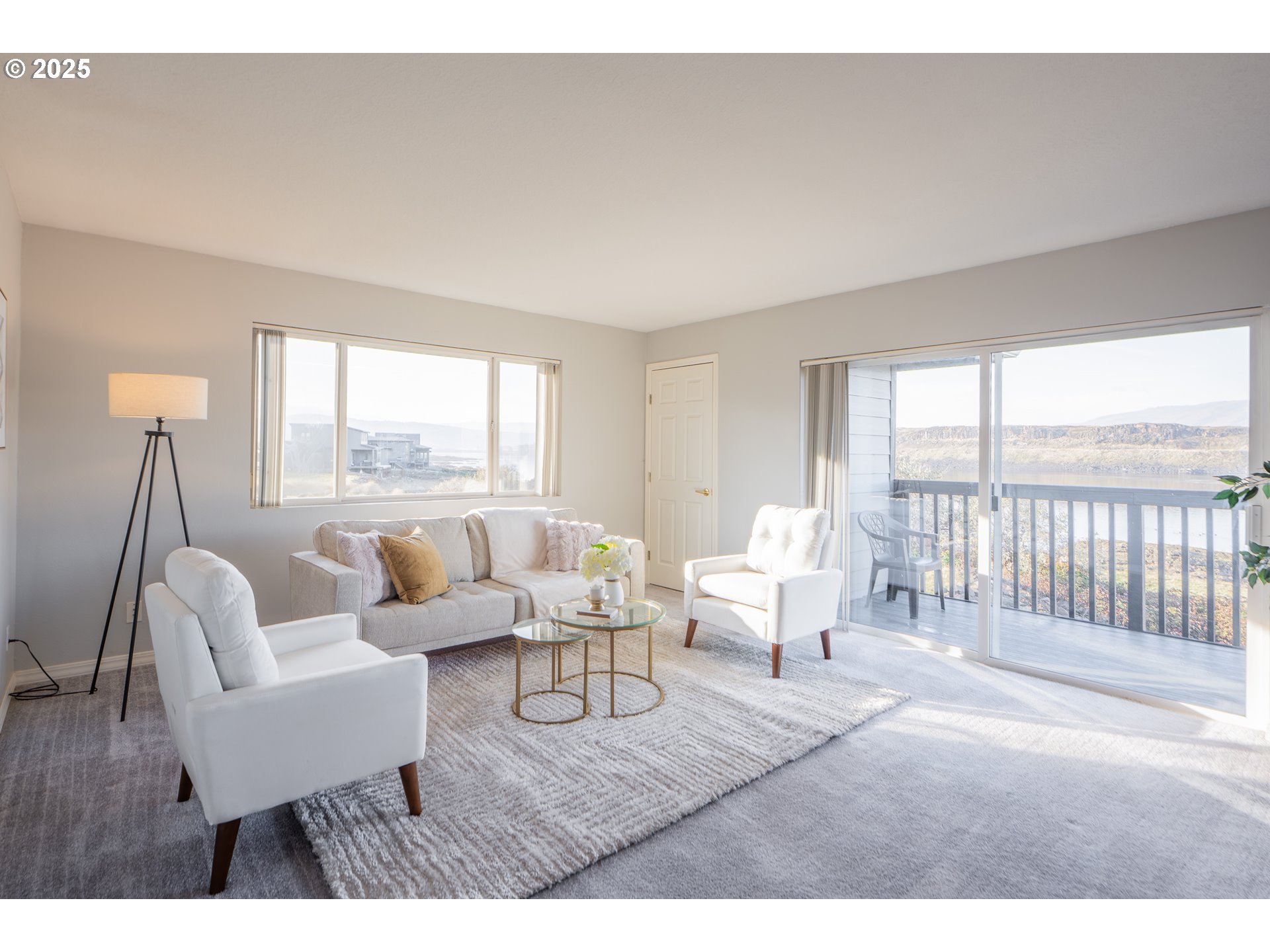 240 Lone Pine Lane, Unit 2 The Dalles, OR 97058 - Photo 7 of 37 a living room with furniture and a large window