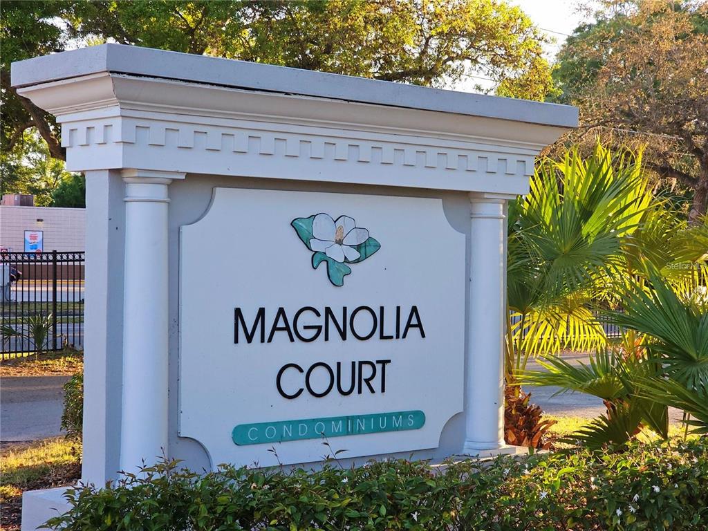 7656 Forest City Road, Unit 110 Orlando, FL 32810 - Photo 1 of 1 a sign that is on the side of a building