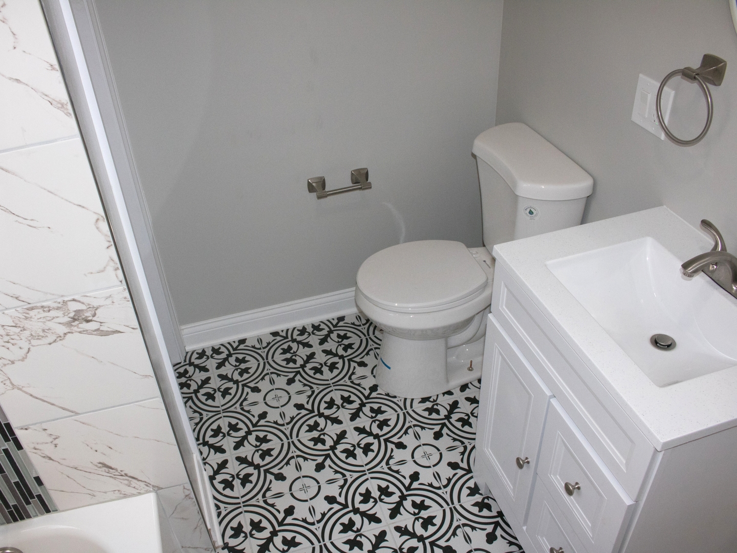 3257 West Warren Boulevard, Unit 2 Chicago, IL 60624 - Photo 10 of 10 a white toilet sitting next to a white sink