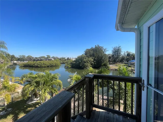 a view of lake with green space