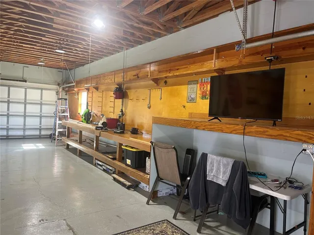 a gym room with chairs and soccer table