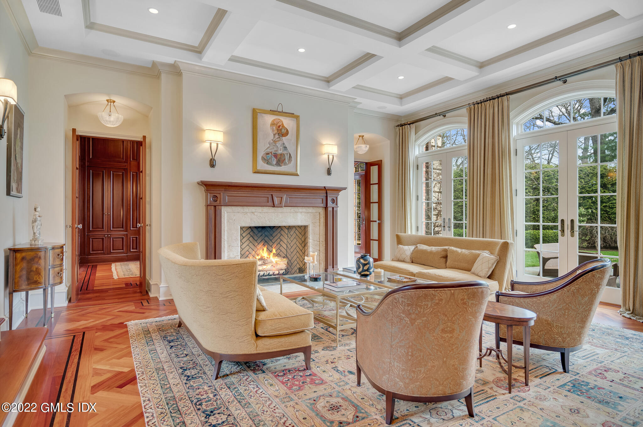 19 French Road Greenwich, CT 06831 - Photo 4 of 32 a living room with furniture a large window and a fireplace