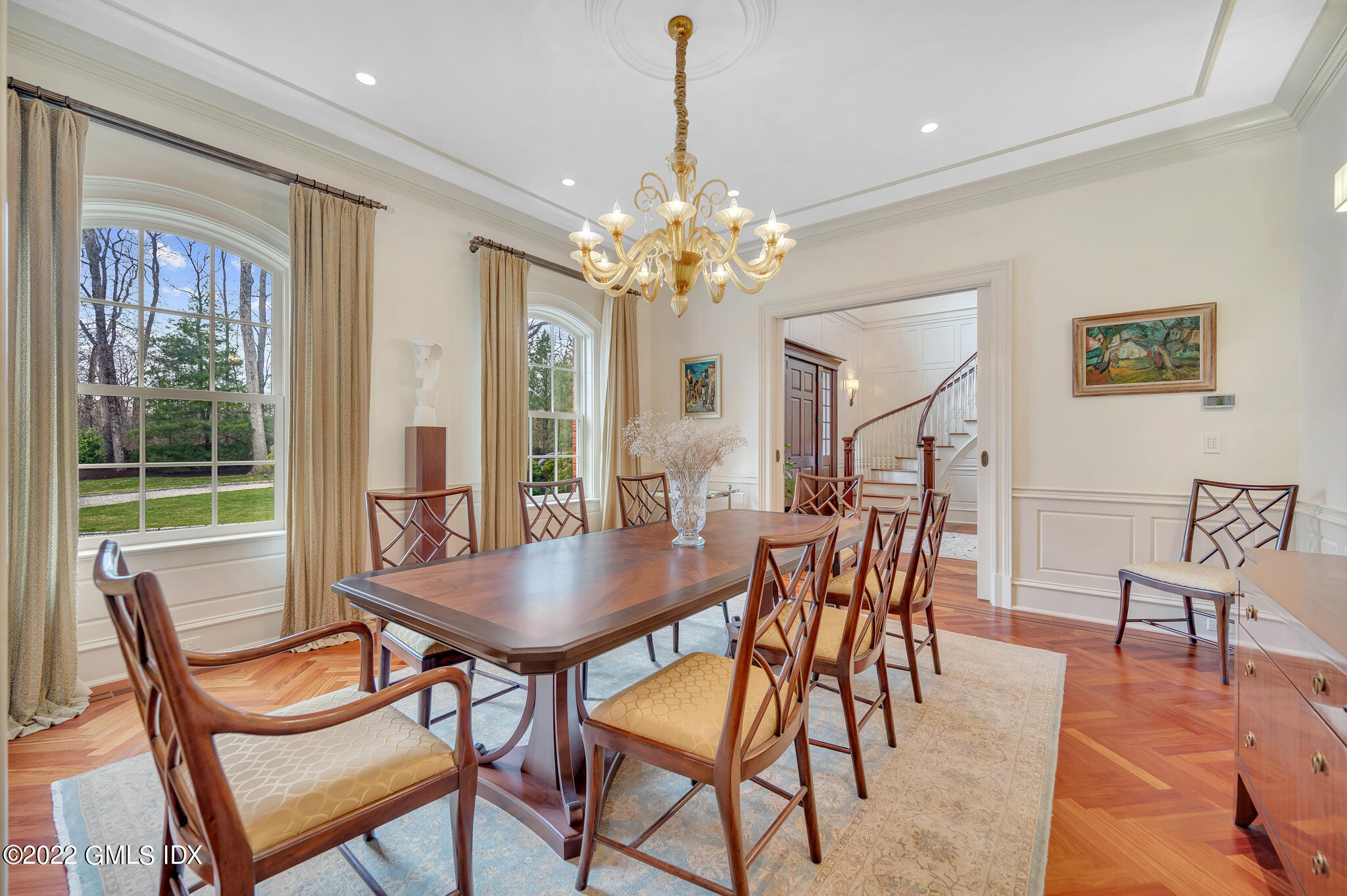 19 French Road Greenwich, CT 06831 - Photo 5 of 32 a dining room with furniture a chandelier and wooden floor