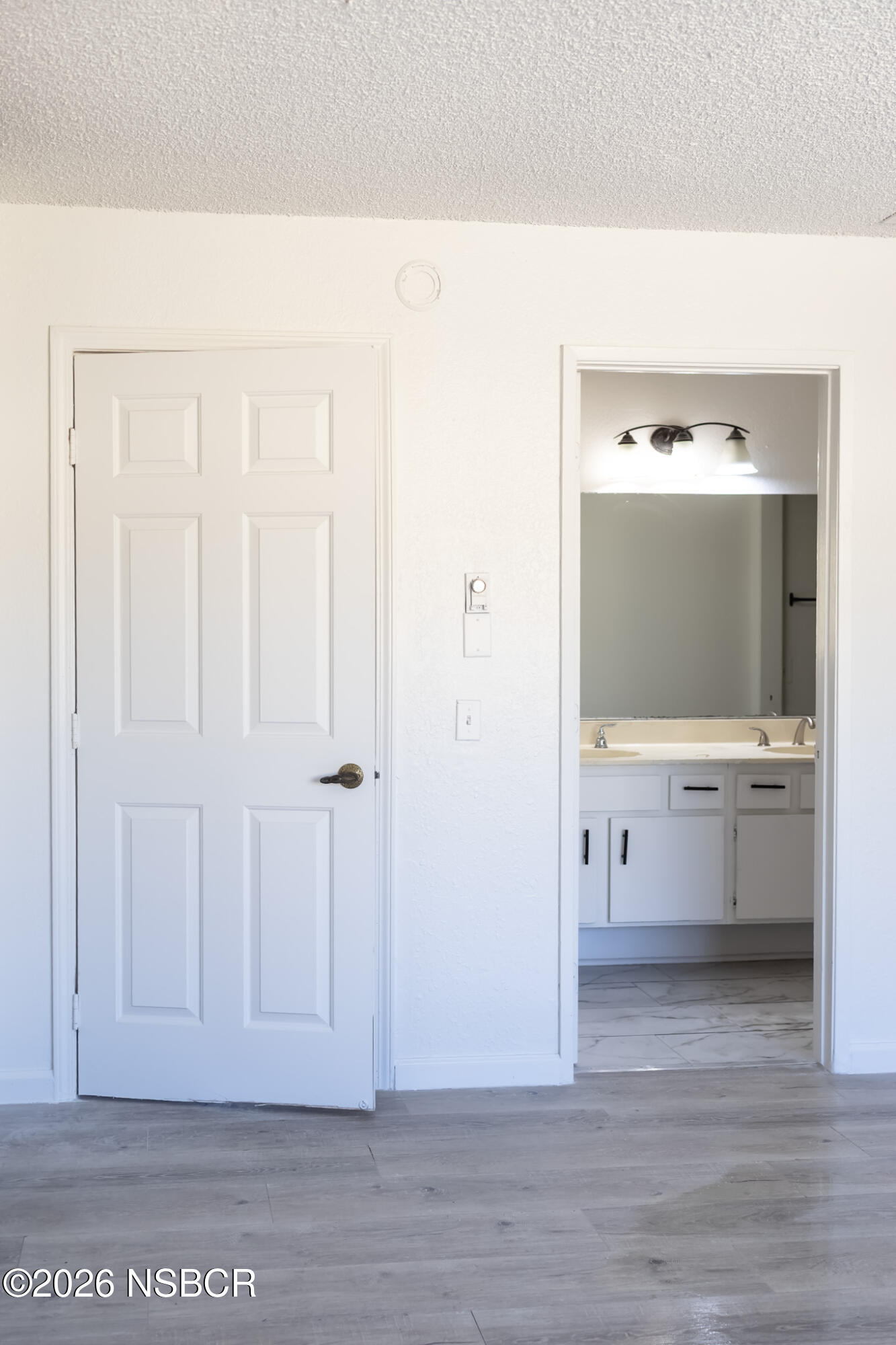 829 Jones Street, Unit 4 Santa Maria, CA 93454 - Photo 11 of 15 a view of bathroom with bathtub and wooden floor