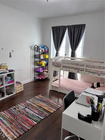 a room with gym equipment and a window