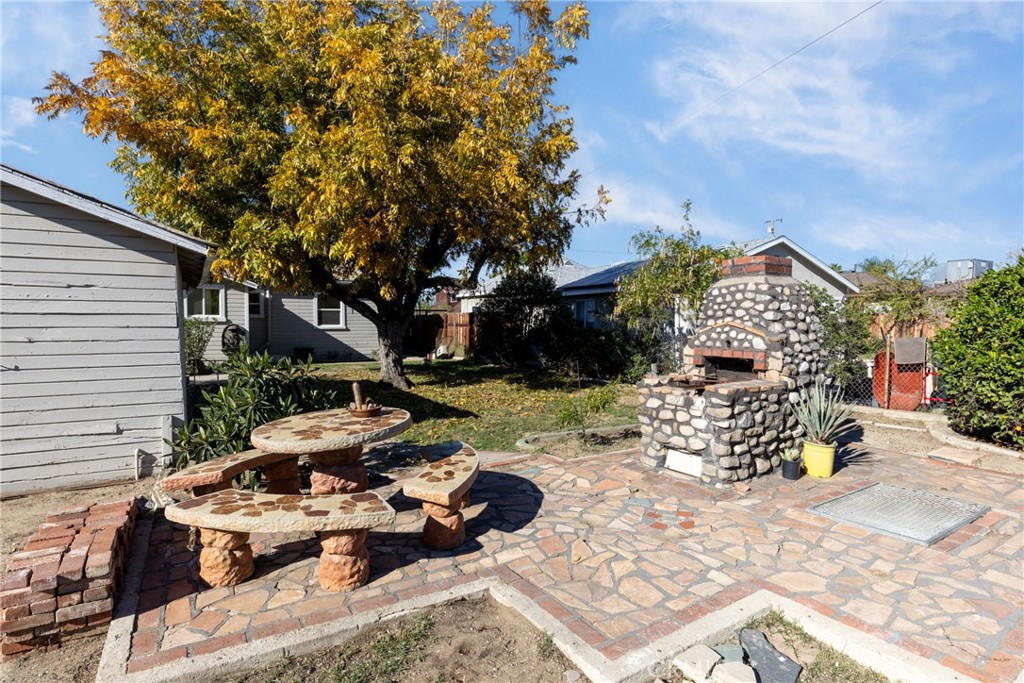 1208 Ohio Street Redlands, CA 92374 - Photo 12 of 14 a view of a chairs and tables in the patio