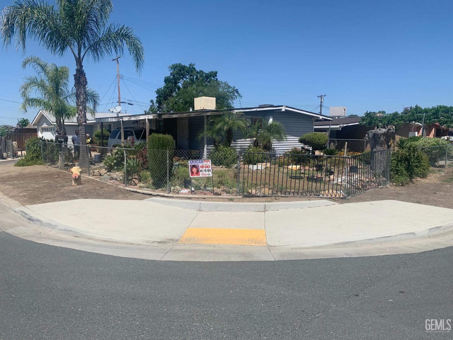 Undisclosed Address Delano, CA 93215 - Photo 1 of 17 a view of swimming pool with outdoor seating