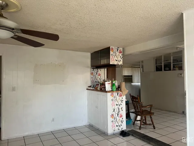a view of kitchen and dining room with furniture