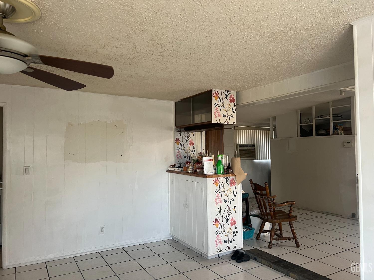 Undisclosed Address Delano, CA 93215 - Photo 11 of 17 a view of kitchen and dining room with furniture