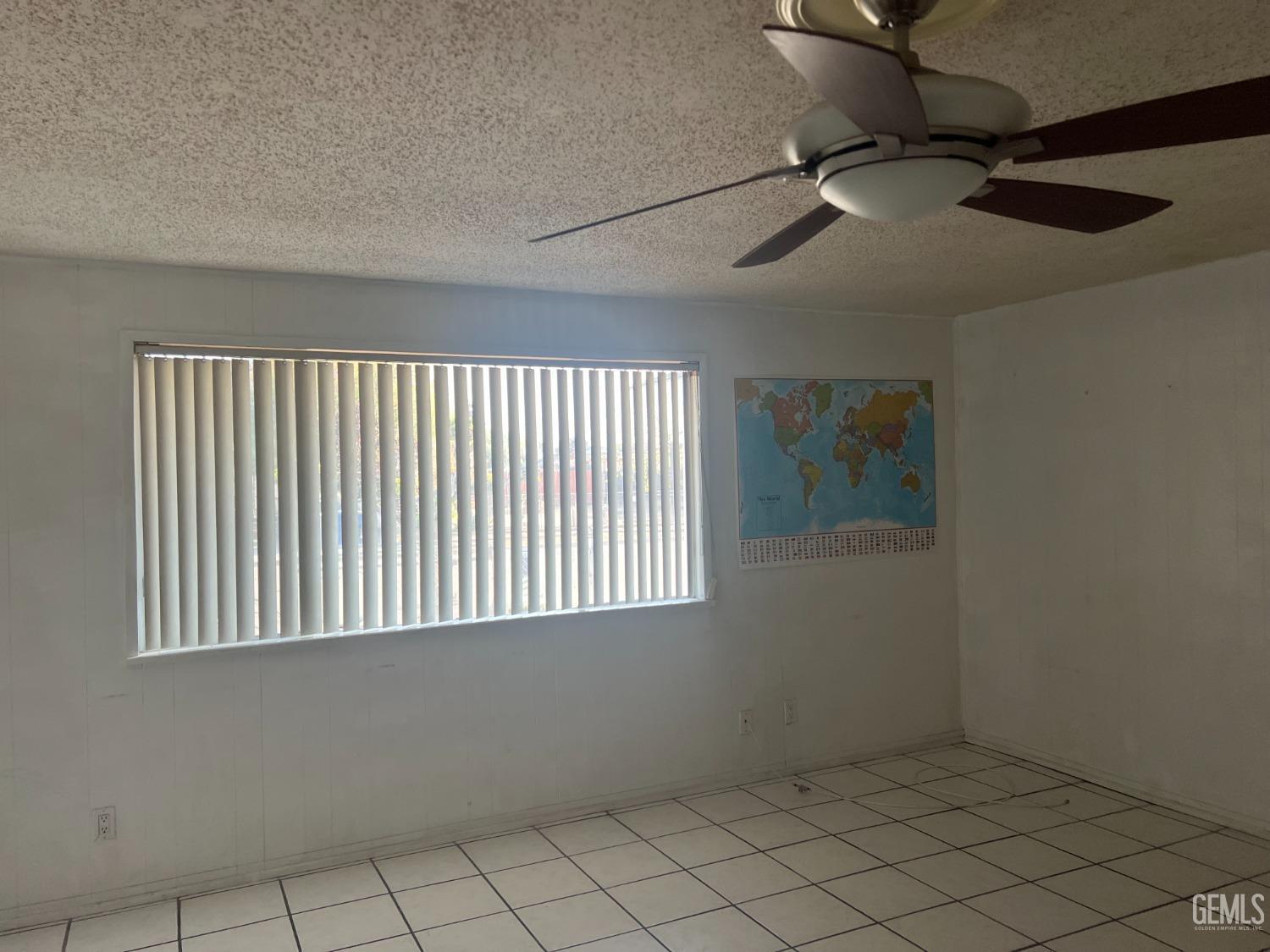 Undisclosed Address Delano, CA 93215 - Photo 12 of 17 a view of an empty room with a window